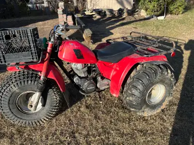 84 Big Red ES. Plastic very good, tires like new, like new muffler, Hi/Lo Reverse, shaft drive , LED...