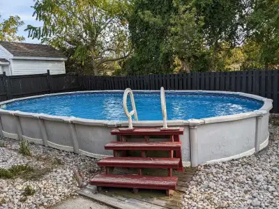 30ft x 15ft Oval Above-Ground Pool (Semi-Inground) – Complete Setup Selling a 30ft x 15ft oval above...