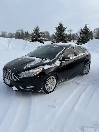 2016 Ford Focus Hatchback, engine runs well, drives nice! (Transmission needs repairs). Paint on rea...