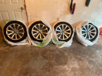 17 inch OEM BMW rims and all season tires