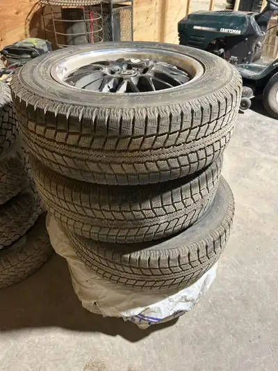 Set of winter tires mounted on rims. - Tire size: 225/65 R17 - Tires in good used condition - Even t...