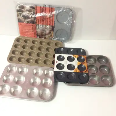 A collection of muffin pans and cupcake tins., View more