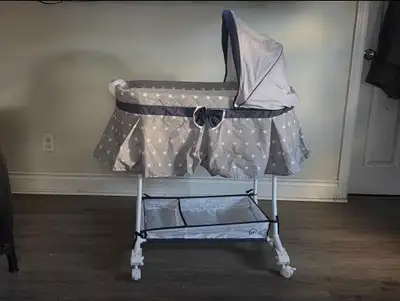 Bassinet, like new. Brand is Bily, View more