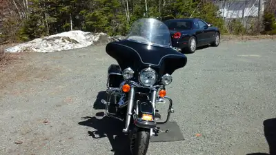 Excellent condition. Alot of added chrome in "Ride to Live, Live to Ride" theme. Harley Davidson sid...