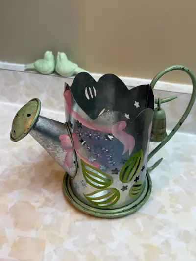 Cute all metal water jug candle holder from party lite, View more