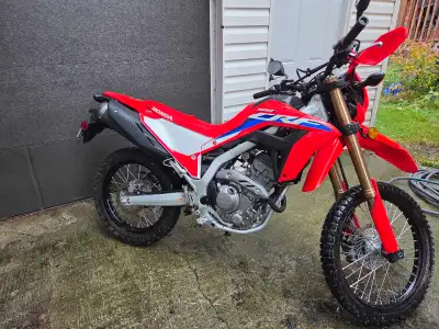 2023 Honda CRF300L. Lowering link. SRC MOTO lowered seat. Adjustable kick stand to accommodate lower...