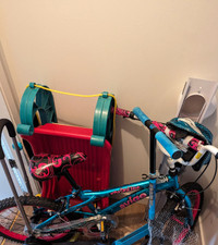 Child's bicycle and snow sled for sale