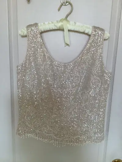 Iridescent white beads, sequins. Hand beaded. Japan. Size more 10/12 than 8/10. Worn once.