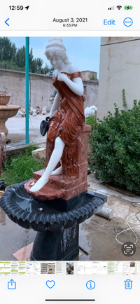 Marble7 feet tall statue with water fountain  price negotiable 