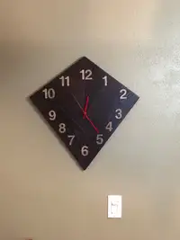 Recycled wood wall clock