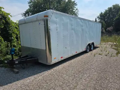 23 foot American Pace Enclosed Car Trailer 2003 ownership in hand. 7000lbs Tire Racks, benches insta...