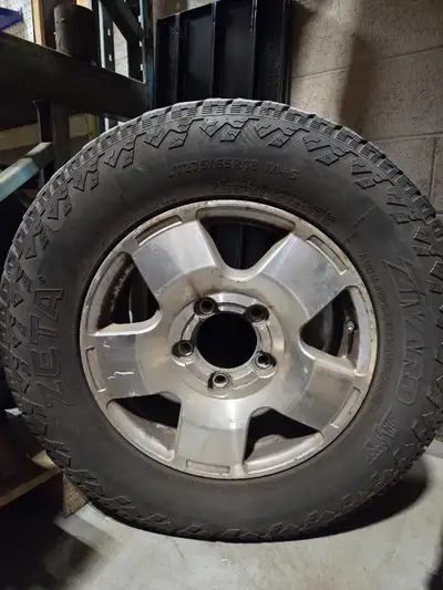 Set of 4 Truck M&S tires on rims off GM 1/2 ton truck. 275 65 18. good shape