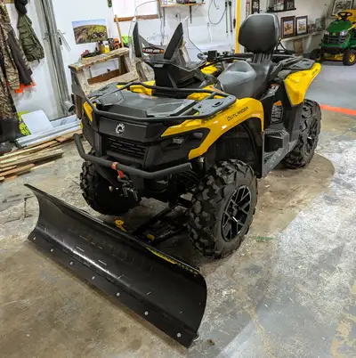 Like new condition, stored in heated garage, undercoated, 369 km, with new windshield and new Can am...