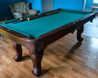 Used in fairly good condition, with many accessories and full set of balls and cues. 7' X 47" We nee...
