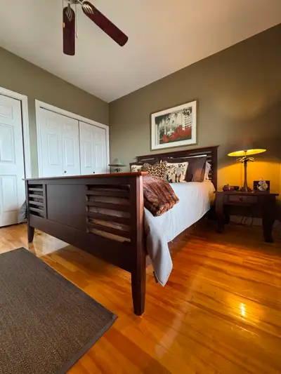 Queen Wooden Bed Frame Featuring a Slatted Head and Footboard, View more