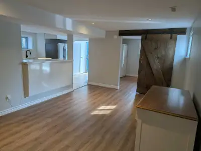 Welcome to this beautifully finished one bedroom, one bathroom legal walkout apartment. The unit has...