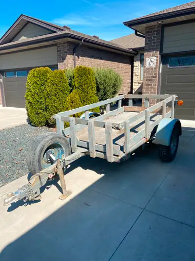 Rugged, built by a blacksmith! 4X8 deck, removable side and end racks Good rubber and spare wheel. U...