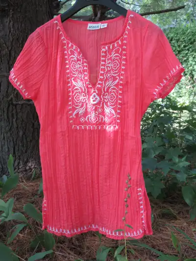 Light shirt size medium, View more