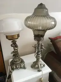 Pair  of antique cherub brass lamps