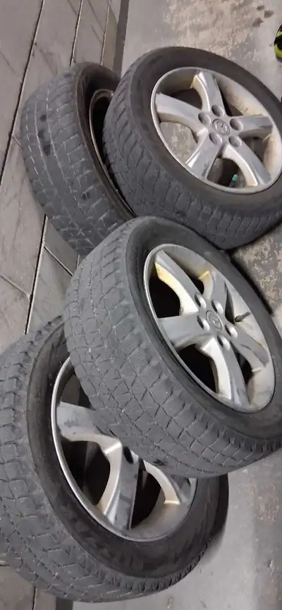 Selling a set of four winter tires, size 205-55-16. These tires are used, as you can see from the ph...