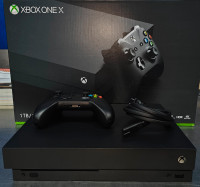 XBOX ONE X 1tb SSD, LIKE NEW IN BOX, BLUE-RAY 4K HDR, 3 GAMES