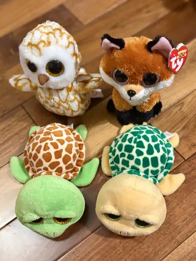 Selling a collection of adorable Ty Beanie Boos plush toys, including an owl, fox, and two turtles,...