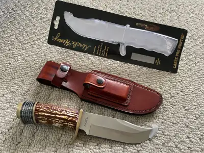 Schrade Uncle Henry ® knife, leather sheath and sharper. New!, View more
