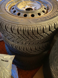 Good Year winter tires  215/60/15 w/rims