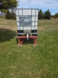 Water tank for garden with stand and concrete post blocks 