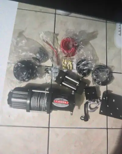 I am selling a new 4000LB Winch, perfect for ATVs, UTVs, and trucks, with a powerful motor and durab...