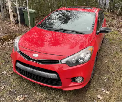 2014 Kia Forte5 SX Turbo GDI. Leather power seats with heating and cooling, heated steering wheel, B...