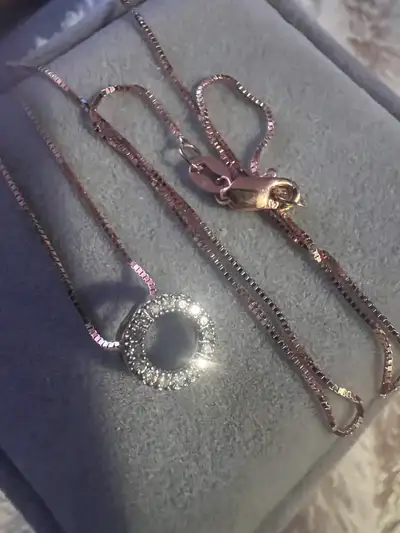 10 k diamond pendant and chain, View more