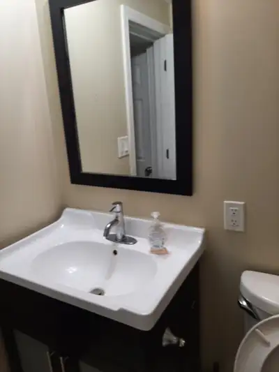A private bedroom is available in a ground-level walkout basement, located at Morningside and Ellesm...
