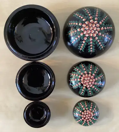 The hand painted flowers on these lovely trinket boxes are in relief, giving them a wonderful textur...