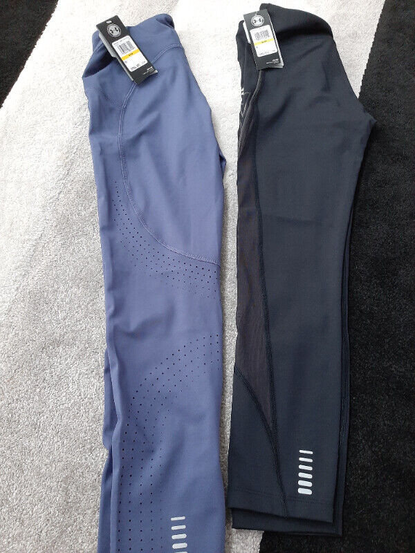 Brand new tag attach Under Armour heat gear medium leggings in Women's - Bottoms in Edmonton