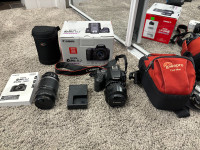 Canon SL2 digital camera with extra lens and bags