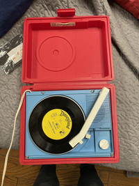 Vintage Sears vinyl record player with Disney record 