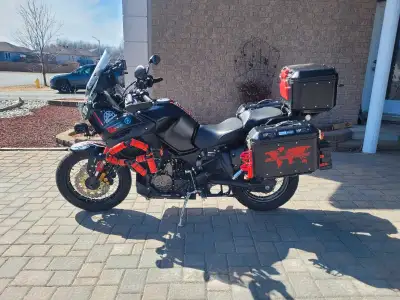 Great riding bike with under 9200 kms. Sport/Touring modes, electronic suspension (adjust suspension...