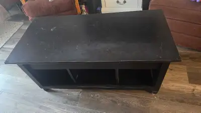 Heavy coffee table that opens for extra storage. 41" x 19.5"