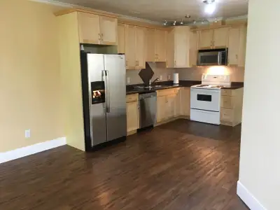 One Bedroom Basement Suite Available Private Entrance All Utilities Included, One Year Lease, NO SMO...