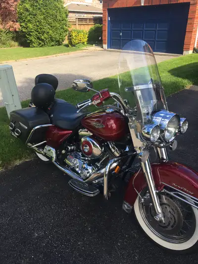 Great running and looking Road King. New pads new tires lots of chrome hard leather bags new custom...