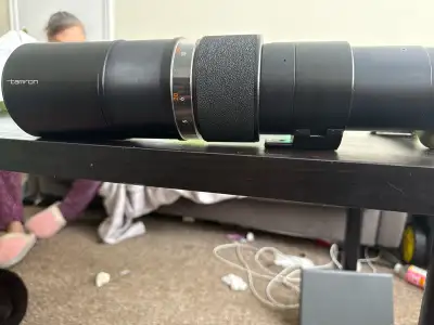 Used Tamron camera lens. 82mm 200-500mm. Has case and top grip has fallen off. Great shape and would...