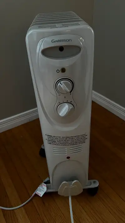Garrison Oil Filled 7-Fin Radiator Style Heater From Canadian Tire. Garrison Oil Filled Heater is pe...