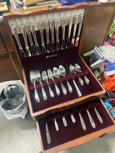 This is a used set of 1847 Rogers Brothers silverware, complete with a wooden storage box, perfect f...