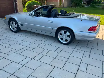 2002 Mercedes 500 SL ( R129) convertible 46,000 km , dernière année , silver interieur noir , toute...