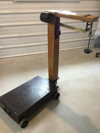 Antique platform scale on wheels, can weigh 1000 lbs.