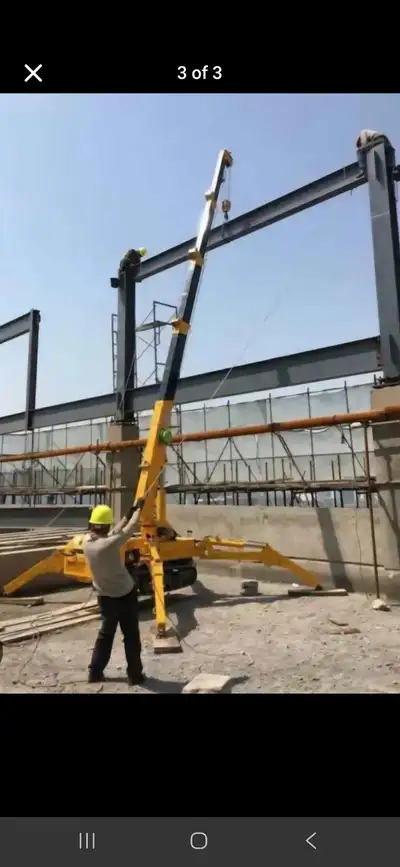 Rough Terrain Crawler Self-Propelled spider crane / spider boom lift 3T Bucket is included. Roof ind...