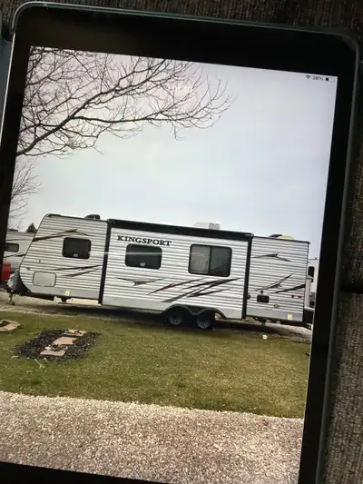 Beautiful towable trailer parked at Wildwood Golf and RV Park , lot fees paid for 2025 .one bedroom...