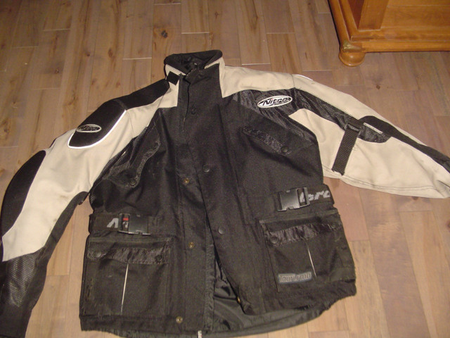 Manteau de moto dans Femmes - Hauts et vêtements d'extérieur  à Sherbrooke
