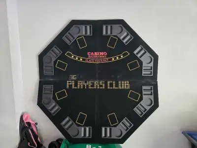 Elevate your home game with this pre-owned, octagonal folding poker table top, designed to bring the...